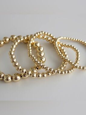 16 Pieces of Plunder Gold Beaded Stretch Bracelets
